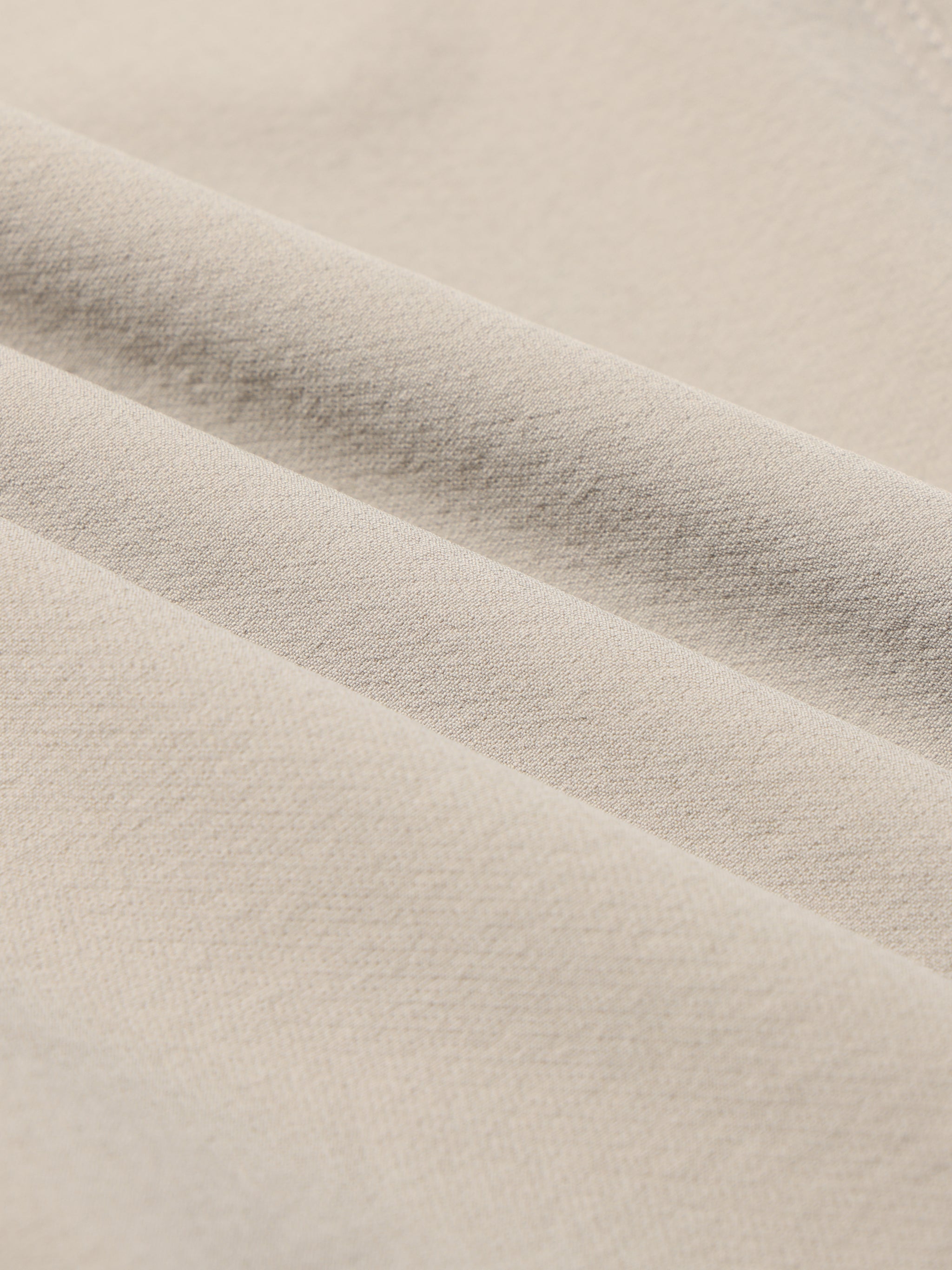 Fabric of Camel Cordura® Softshell Pants, built for hiking with water resistant softshell fabric and stretch fit