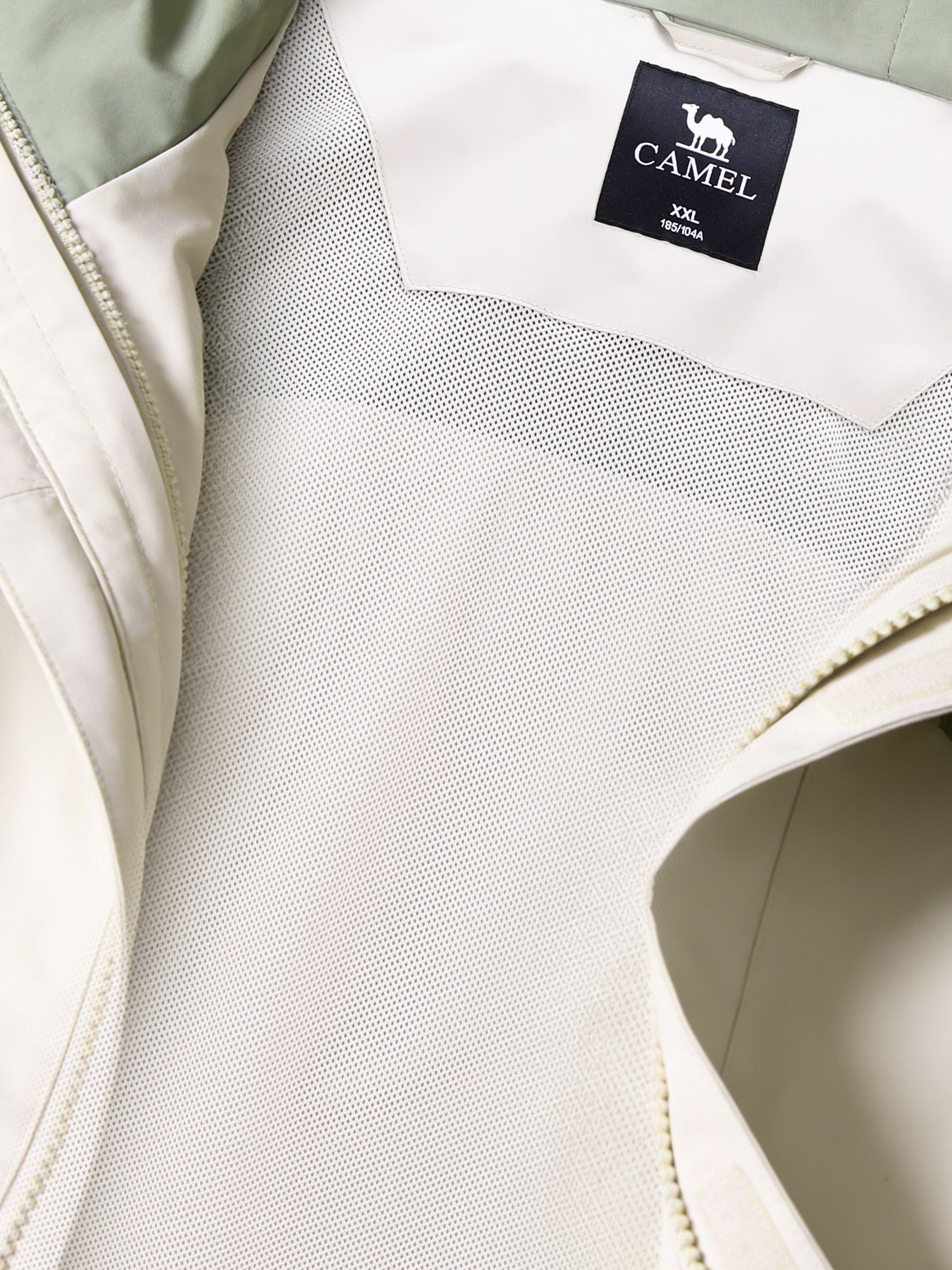 Inner of Camel Men’s Interstellar Traverse TOPEAK-TEX® Shell Jacket designed for trail and urban use with adjustable fit