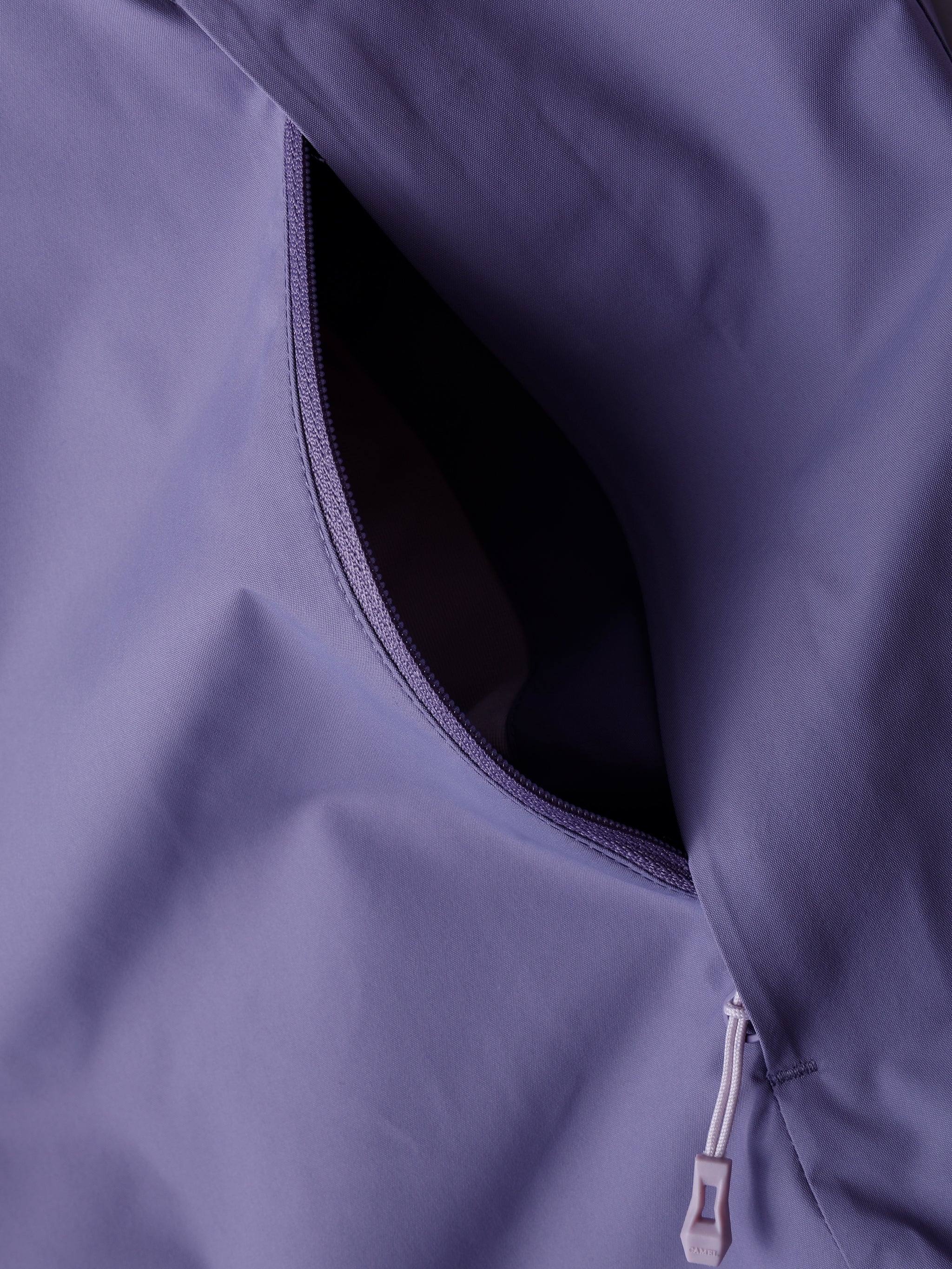 Pocket of Camel Women’s Arctic Sentinel Elite Toray Dermizax® 3-in-1 Jacket featuring waterproof shell and thermal fleece