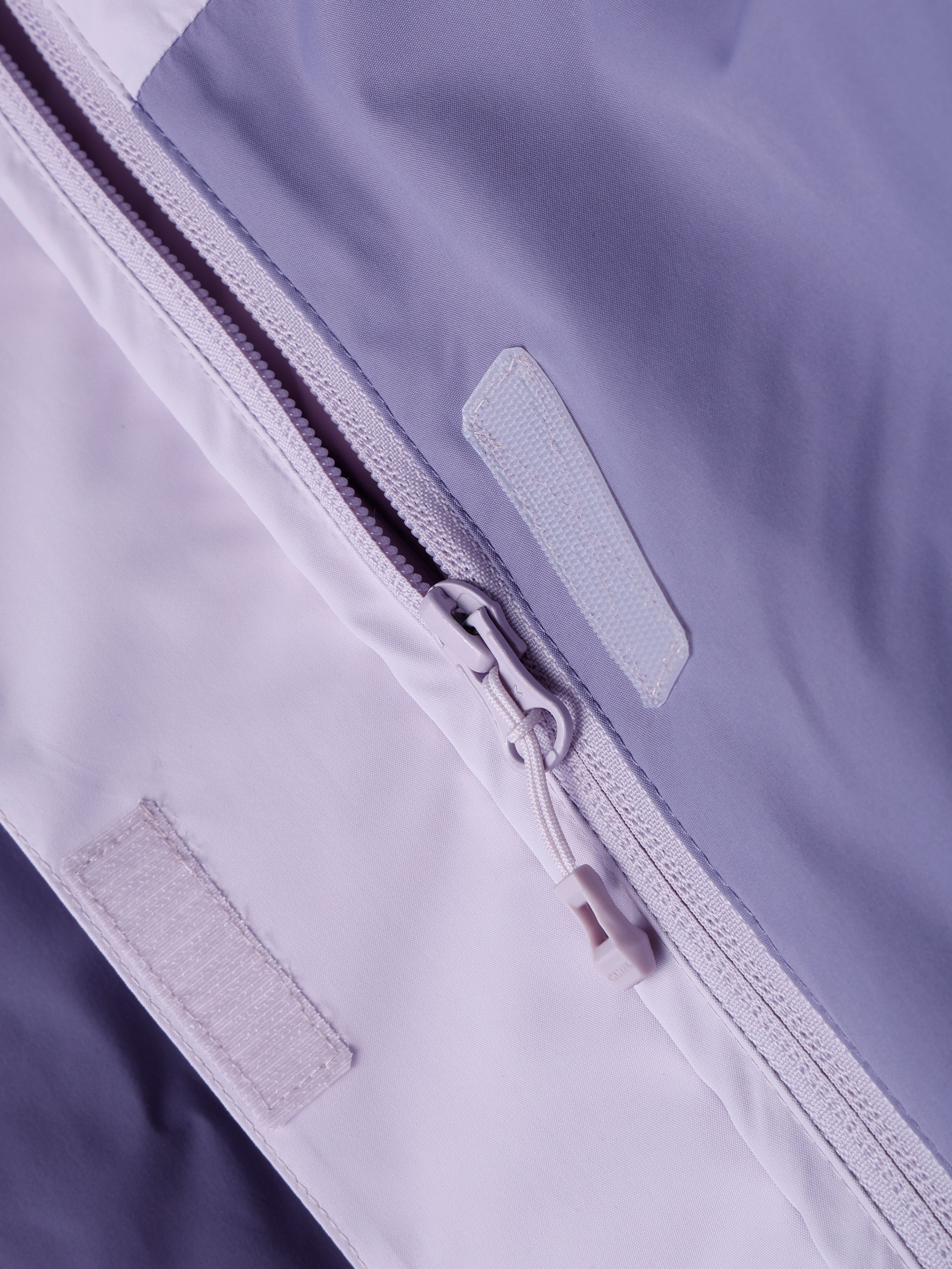 Zipper of Camel Women’s Arctic Sentinel Elite Toray Dermizax® 3-in-1 Jacket featuring waterproof shell and thermal fleece