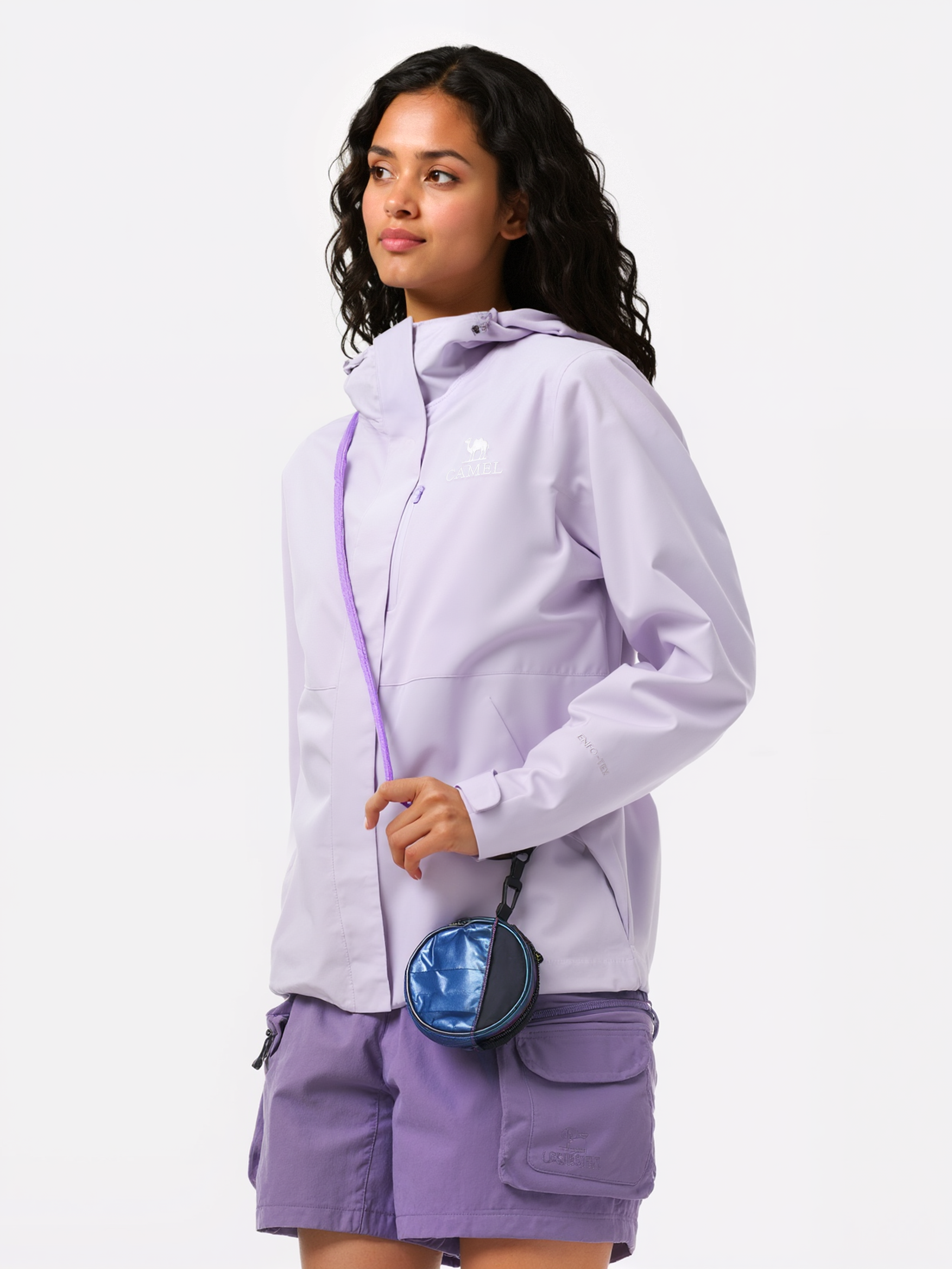 Side view of Camel Women’s Interstellar Lightweight Shell Jacket, highly waterproof, breathable, storm-ready hiking coat