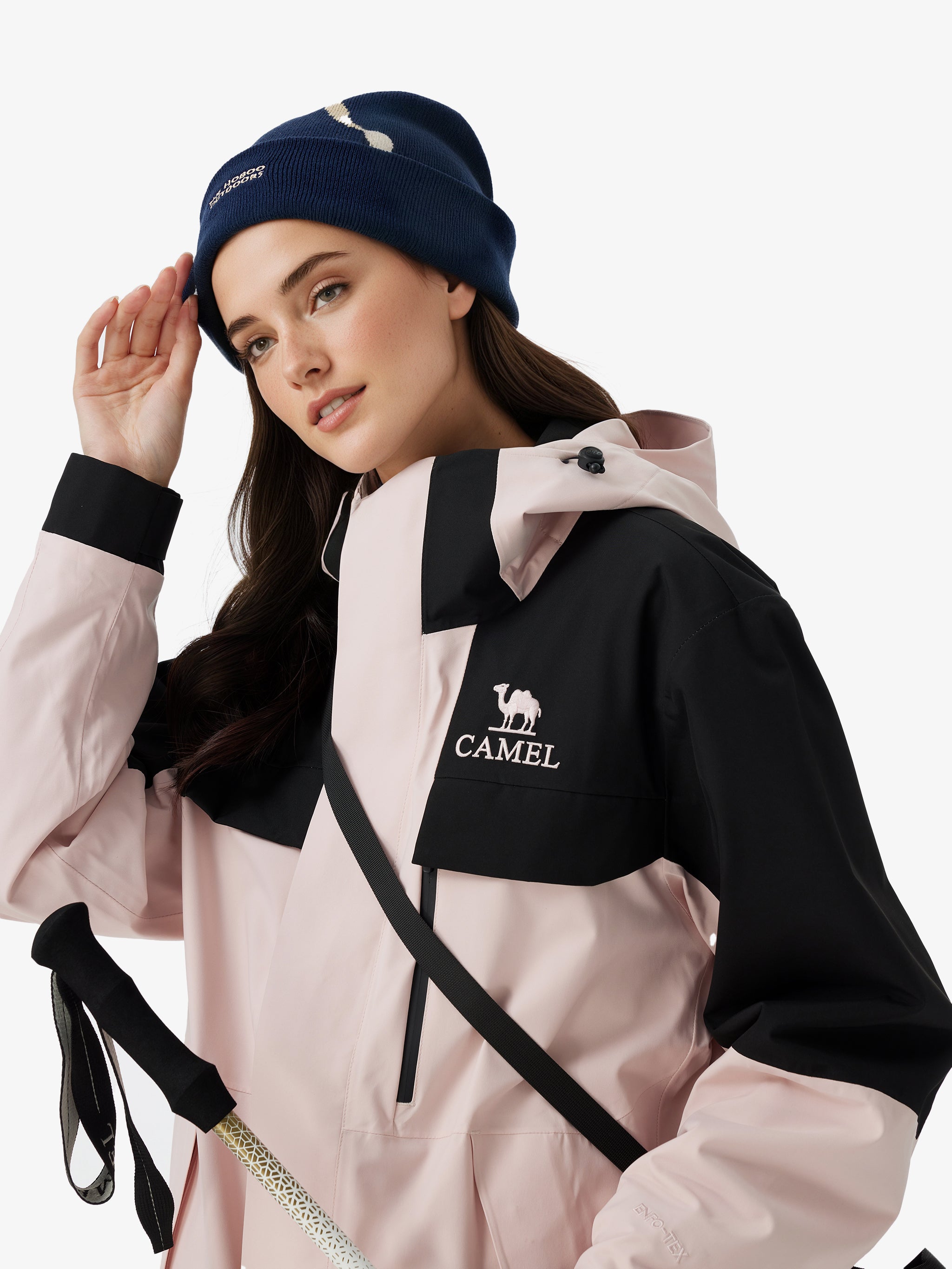 Side view of Camel Women’s Arctic Sentinel Paneled 3-in-1 Jacket, built with waterproof outer shell and warm fleece liner
