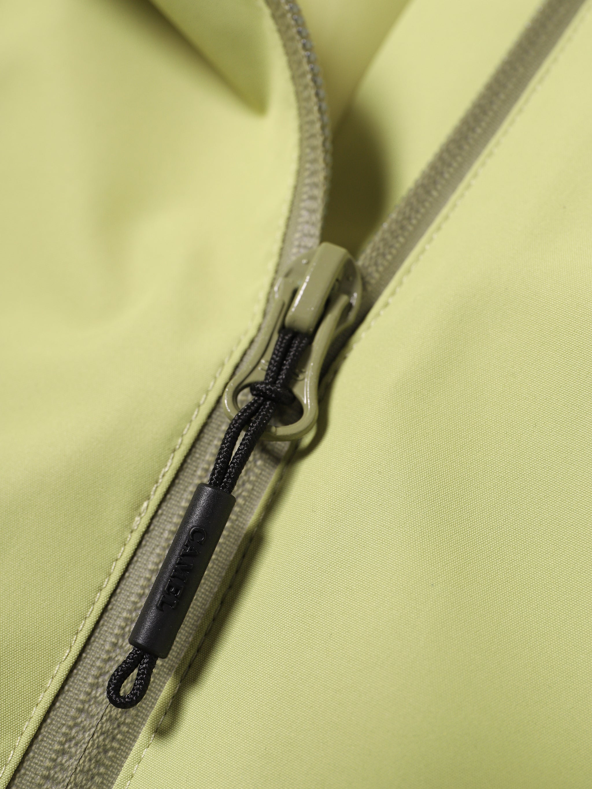Zipper of Camel Interstellar Traverse Lightweight Shell Rain Jacket with breathable 3D ergonomic cut and rainproof
