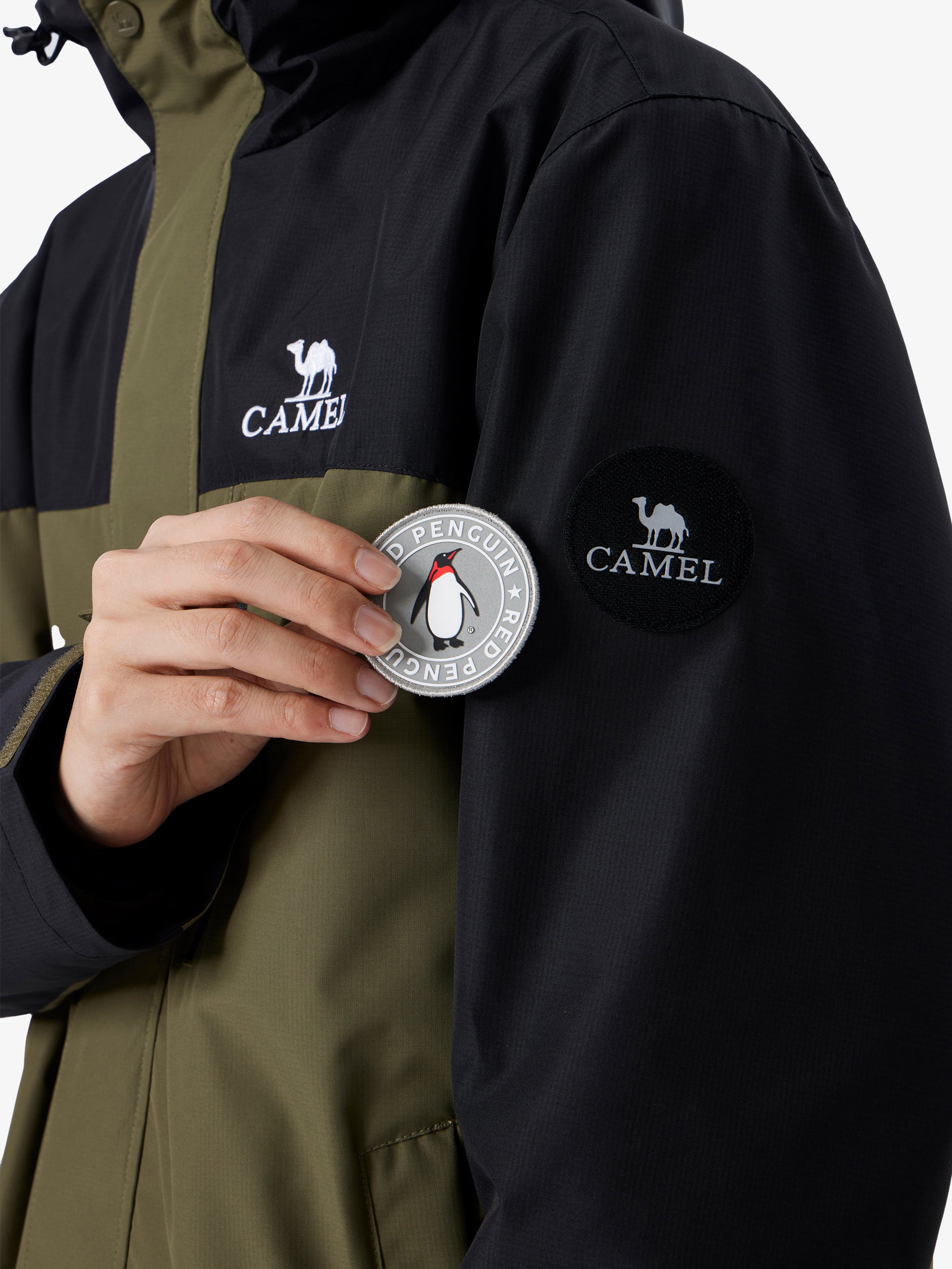 Design of Camel Men’s Arctic Sentinel Paneled 3-in-1 Jacket delivering waterproof, breathable, thermal performance.
