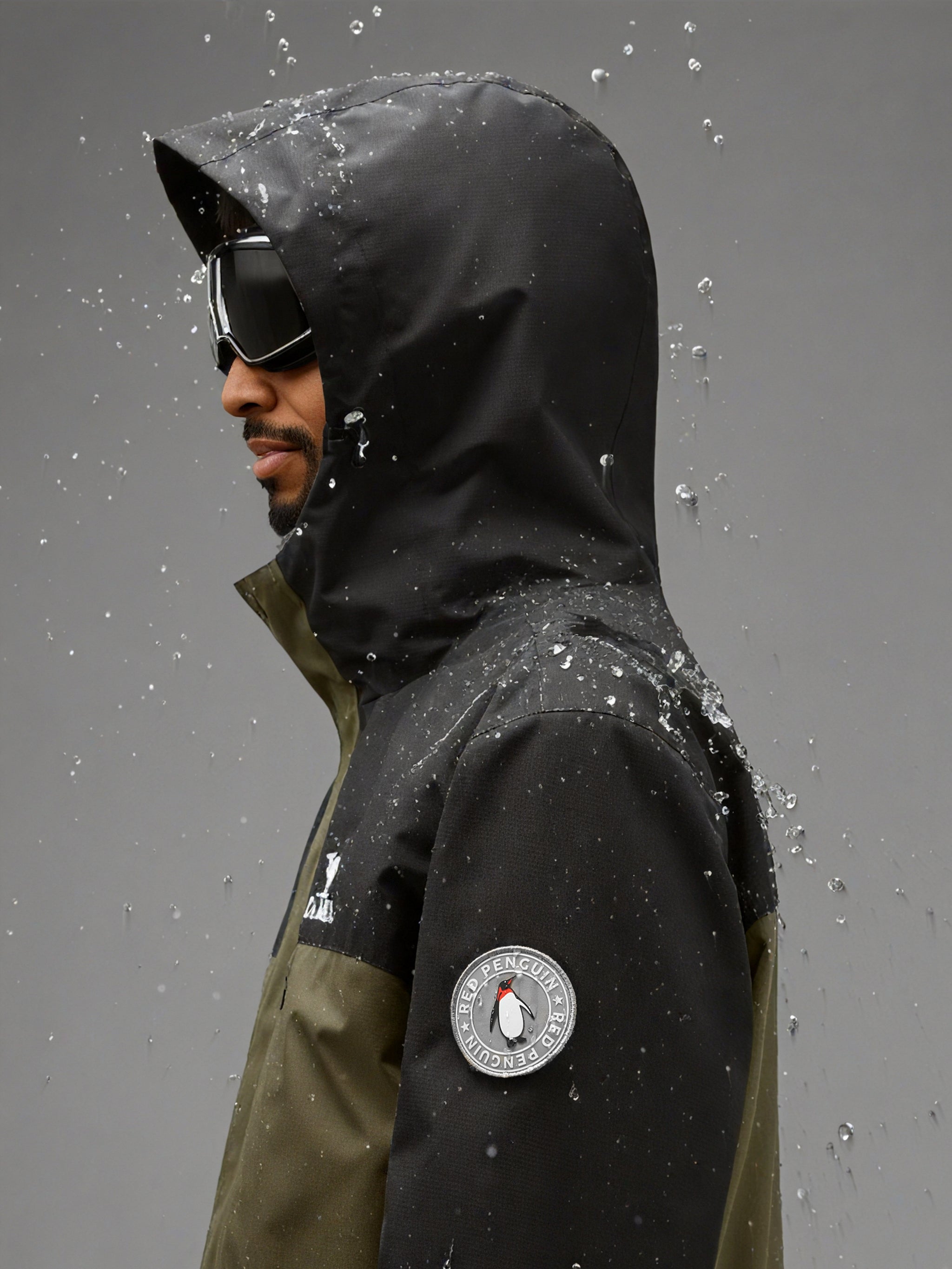 Waterproof show of Camel Men’s Arctic Sentinel Paneled 3-in-1 Jacket delivering breathable, thermal outdoor performance.