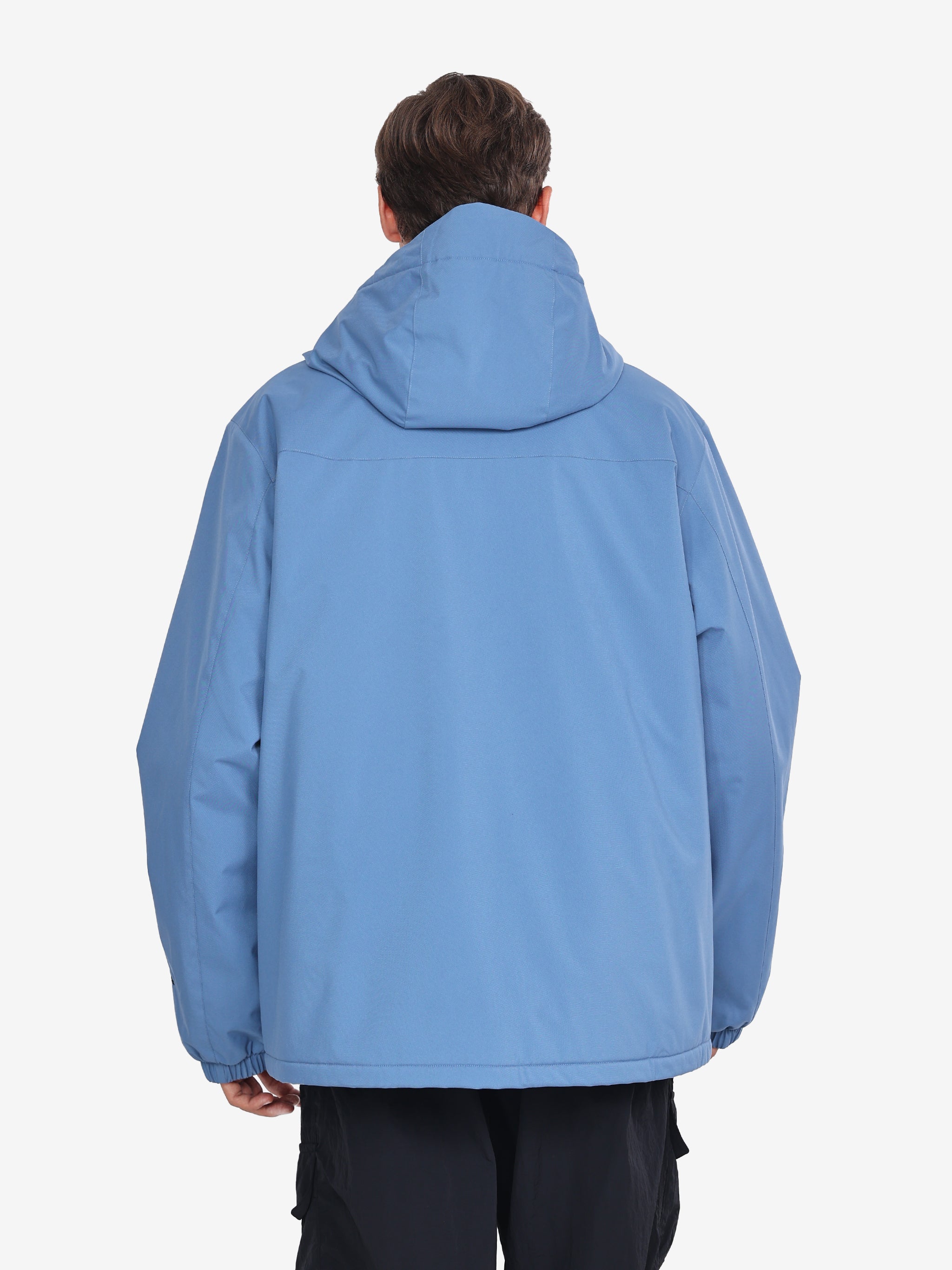 Back view of Camel Men’s Urban Edge TOPEAK-TEX® Insulated Jacket, wool lining, and rugged build for winter adventures.