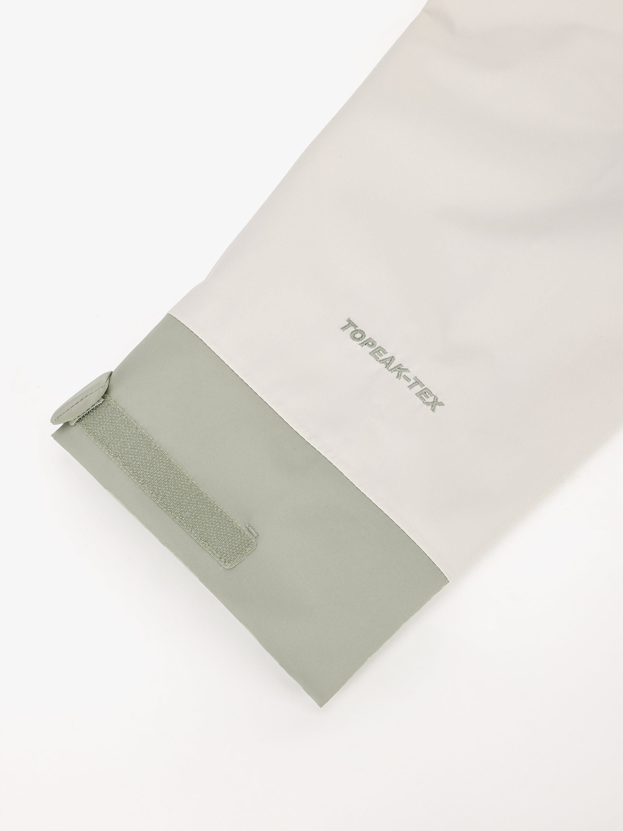 Cuff of Camel Men’s Interstellar Traverse TOPEAK-TEX® Shell Jacket designed for trail and urban use with adjustable fit