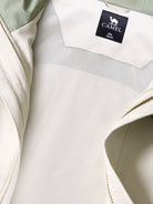 Inner of Camel Men’s Interstellar Traverse TOPEAK-TEX® Shell Jacket designed for trail and urban use with adjustable fit