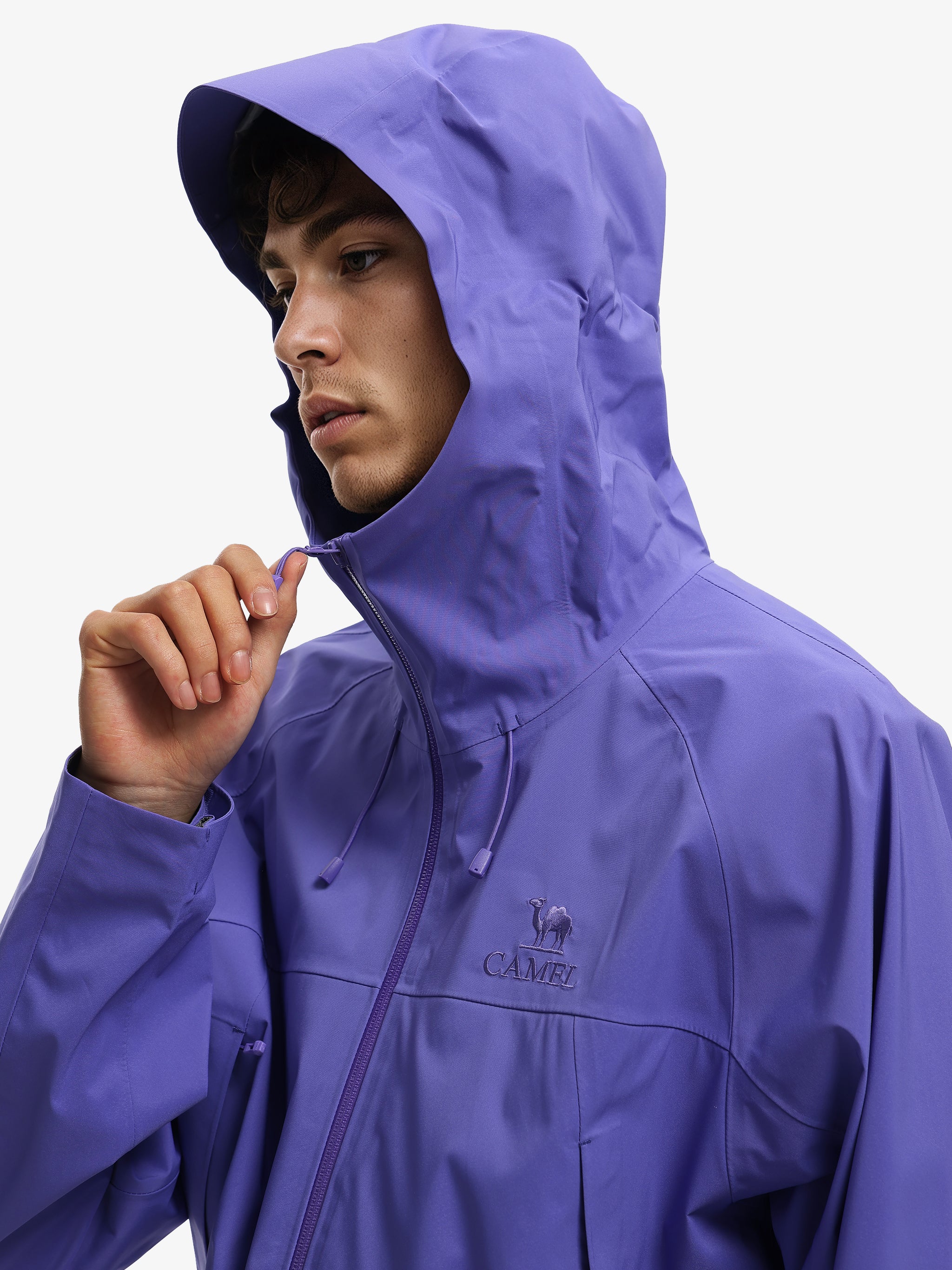 Side view of Camel Interstellar Traverse Toray Dermizax® Hardshell Jacket featuring 3-layer construction for alpine use