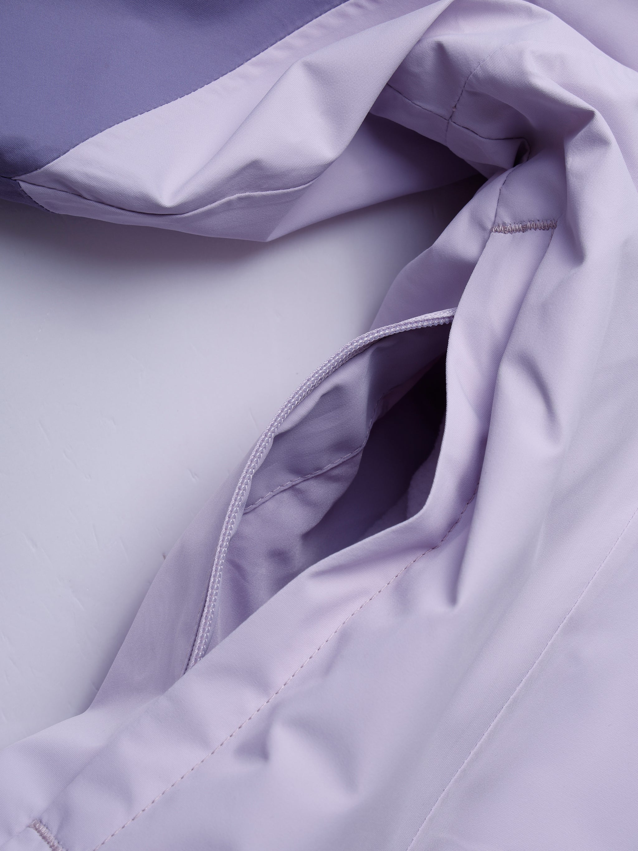 Pit-zip of Camel Women’s Arctic Sentinel Elite Toray Dermizax® 3-in-1 Jacket featuring waterproof shell and thermal fleece