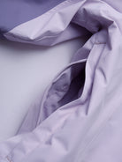 Pit-zip of Camel Women’s Arctic Sentinel Elite Toray Dermizax® 3-in-1 Jacket featuring waterproof shell and thermal fleece