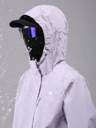 Hood of Camel Women’s Interstellar Traverse Lightweight Shell Jacket, built for outdoor use with waterproof fabric